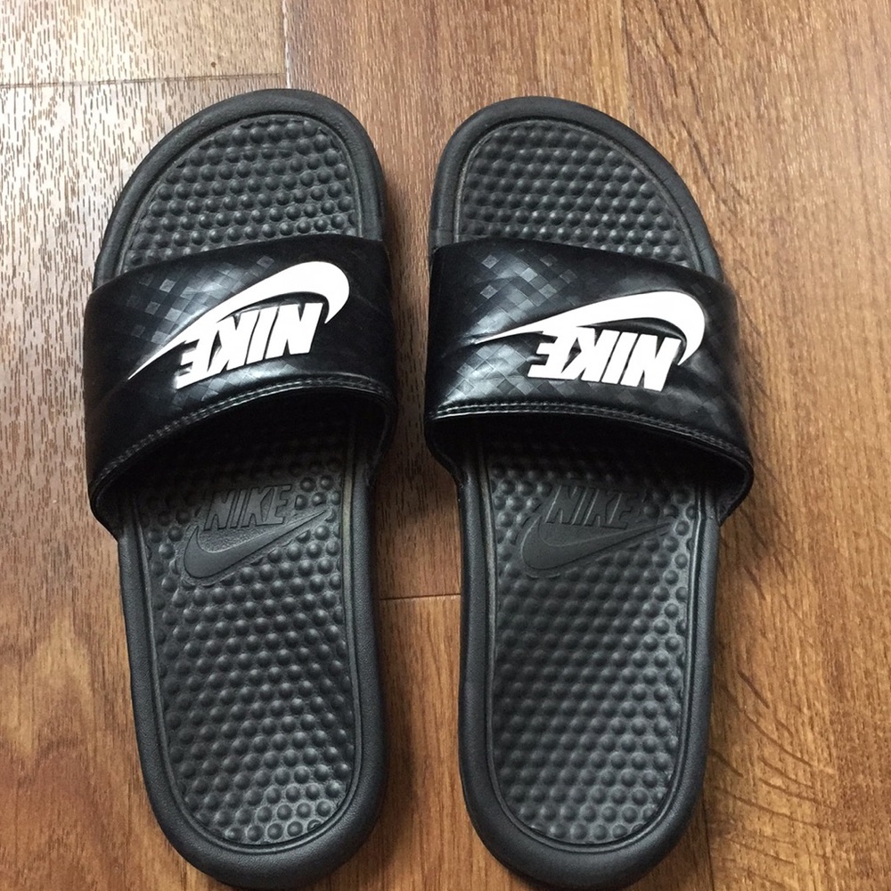 Nike slip on sandals.
